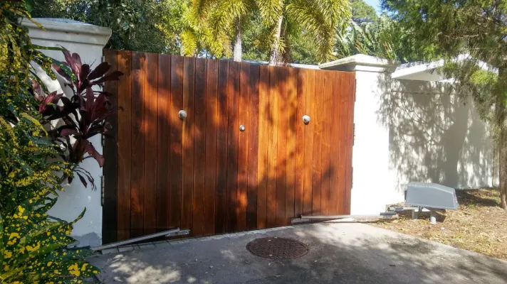 Refinished stained wood gate and fence panels in downtown Sarasota