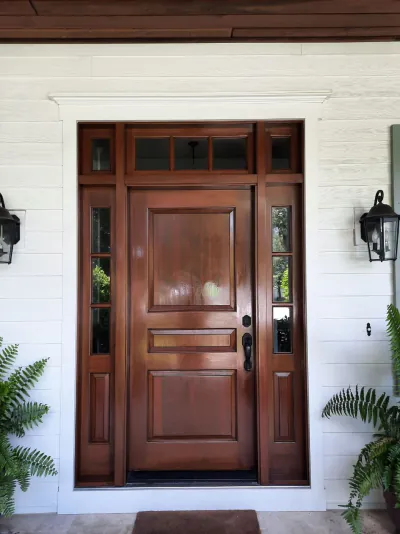 Dark mahogany entry door refinished on Longboat Key