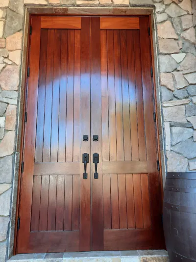 Dark mahogany entry door after refinishing